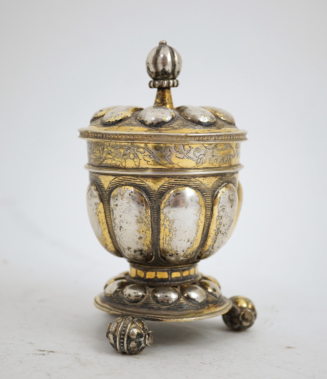 A 16th/17th century German silver gilt 'pineapple' cup and cover